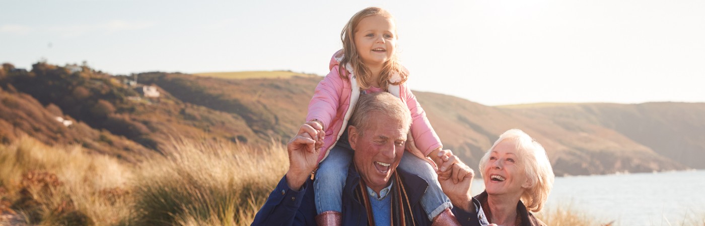 Grandfather and grandchild on shoulders