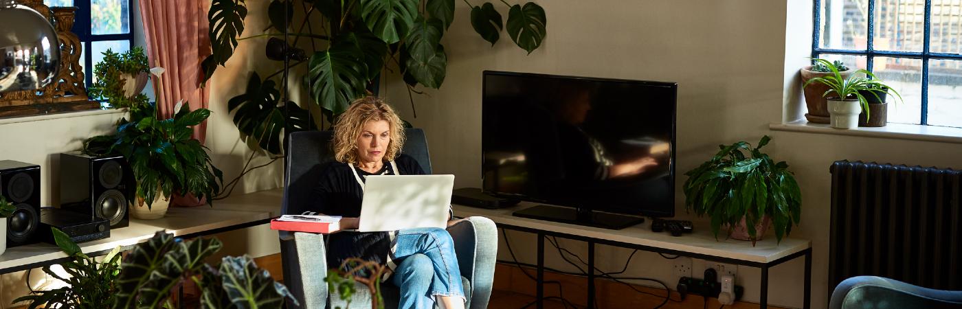 Women in her fifties on laptop