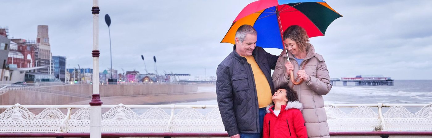 Grandparents and grandson on the pier