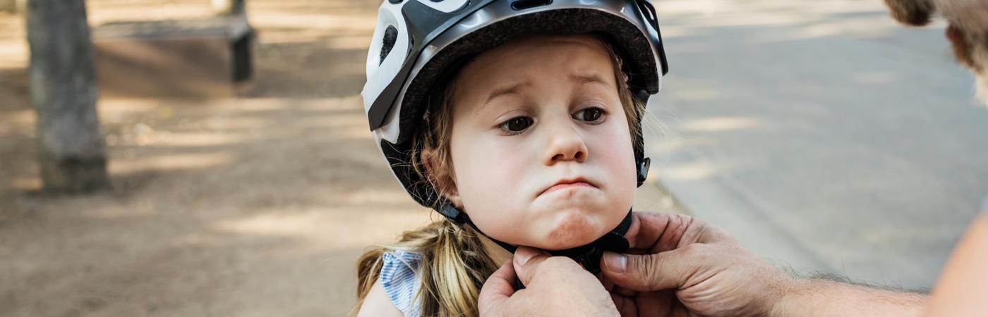 Child wearing bicycle helmet