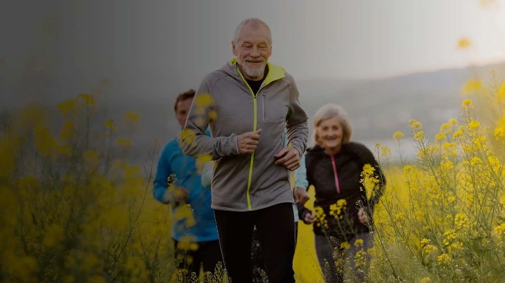 People running through a field