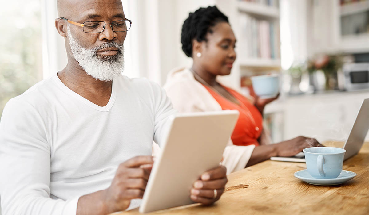 Image of a man using a tablet.