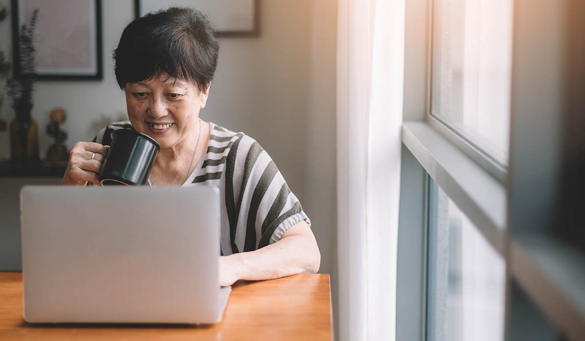 Image of a woman using a tablet computer