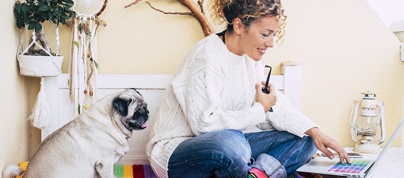 Image of a woman on her laptop