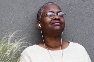 woman listening to podcast