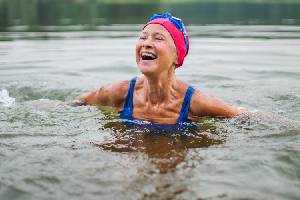 woman swimming in lake