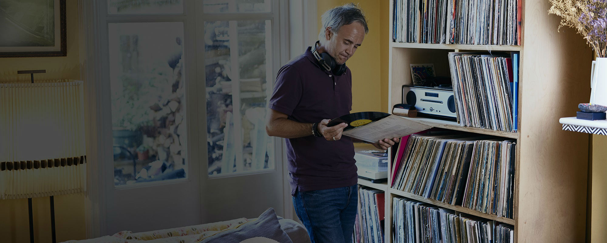 Man looking at he's records