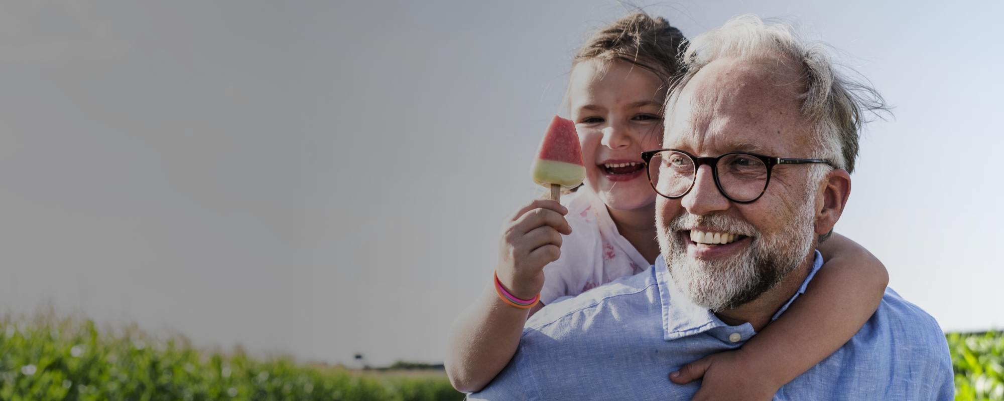 Girl on back eating a lolly