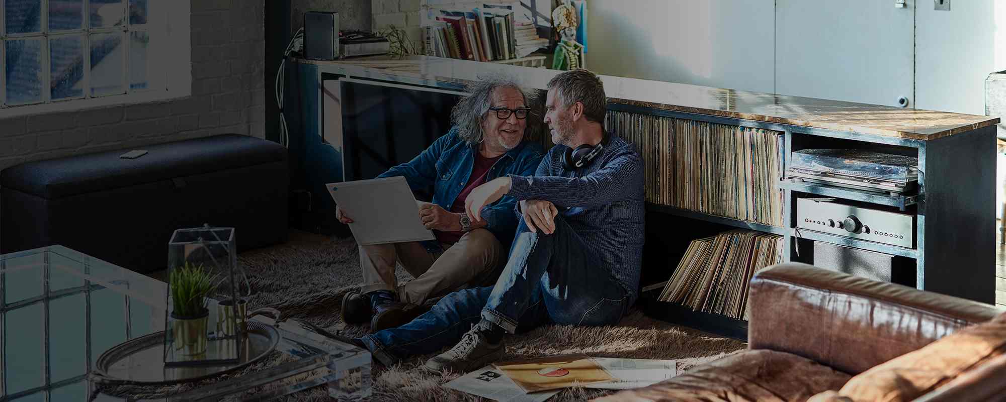 Men sitting on floor