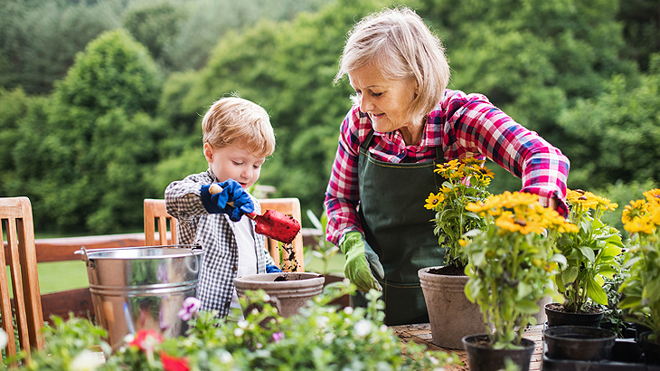 older-woman-and-child-potting-plants-730x410.jpg