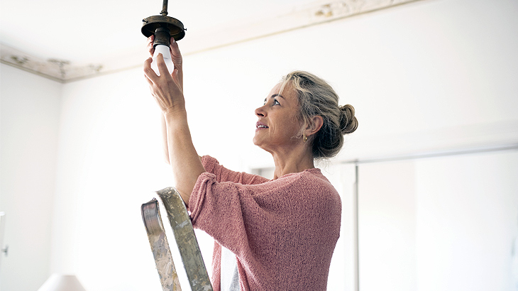 woman-changing-a-lightbulb-730x410.jpg