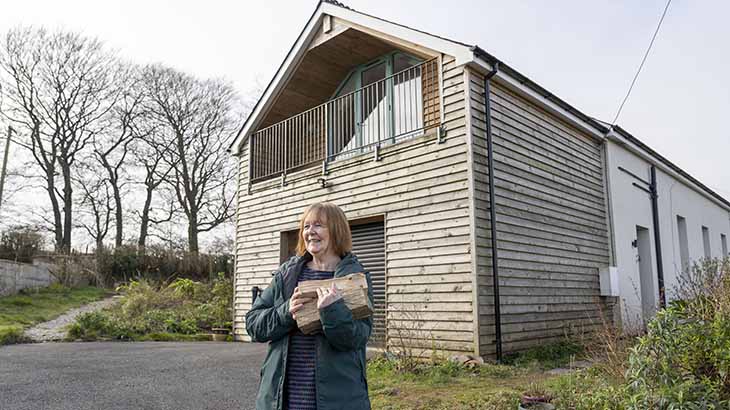 Lillian with her house