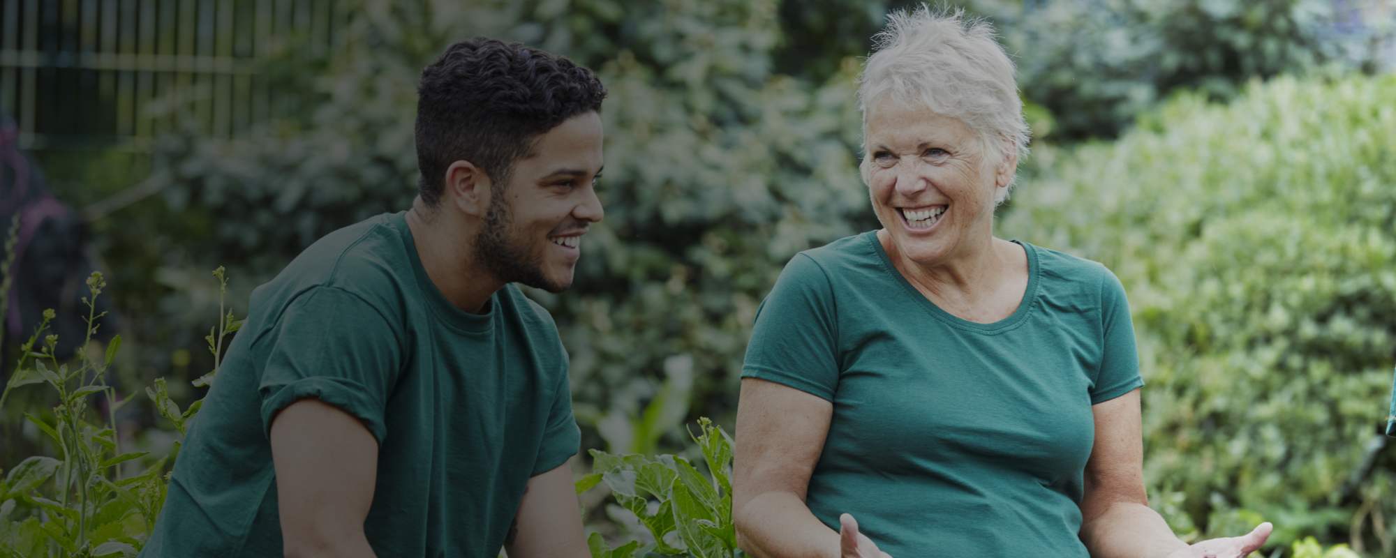 WOMAN AND MAN VOLUNTEERING