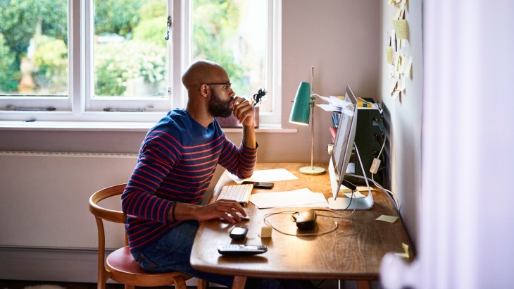 man at home on computer.jpg