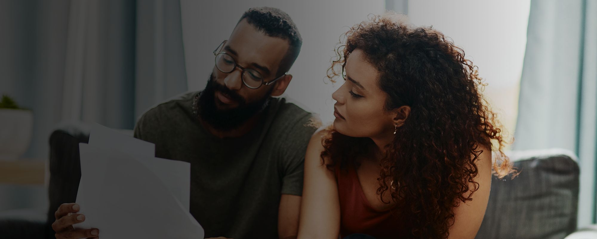 Couple looking at paper