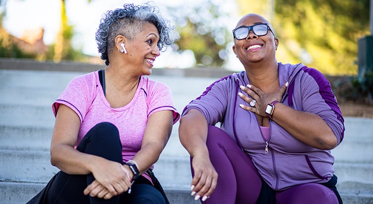 Two women smiling