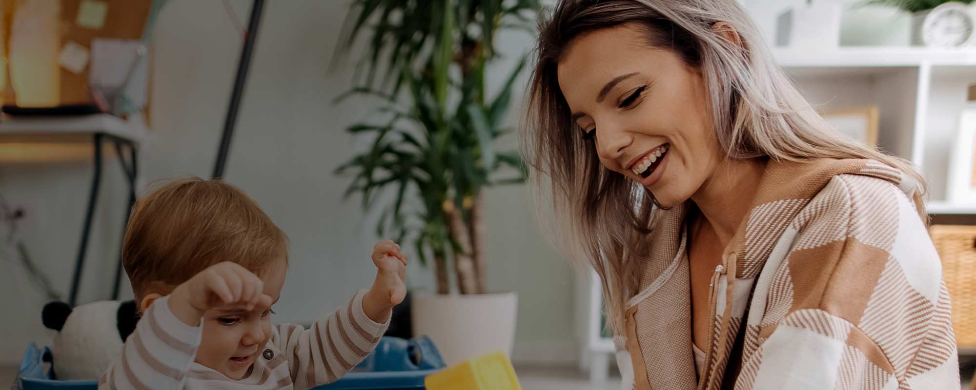 Woman playing with child